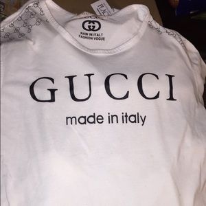 L Gucci shirt